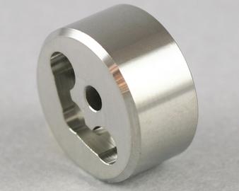 Check valve retainer - manifold side